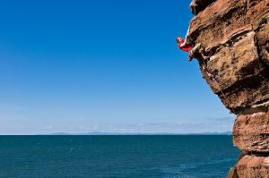 2011 Calendar Comp winner Liam Lonsdale climbing Dreaming of Red Rocks at St Bees